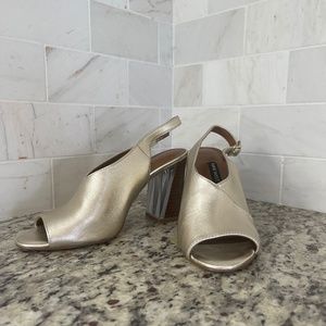 Sling back peep toe block heels in metallic gold